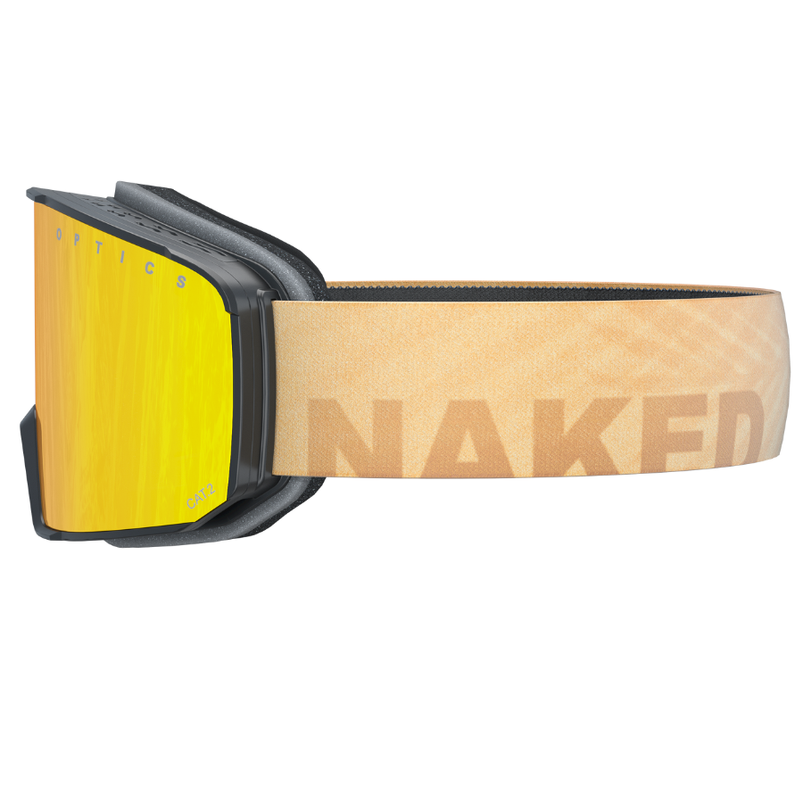 Il modello SOLAR di NAKED Optics presenta lenti gialle e un cinturino color cuoio con la scritta “NAKED” in caratteri in grassetto. Questa maschera da sci compatta è stata progettata appositamente per i visi più piccoli, rendendola la scelta perfetta per le donne che cercano stile e comfort sulle piste.
