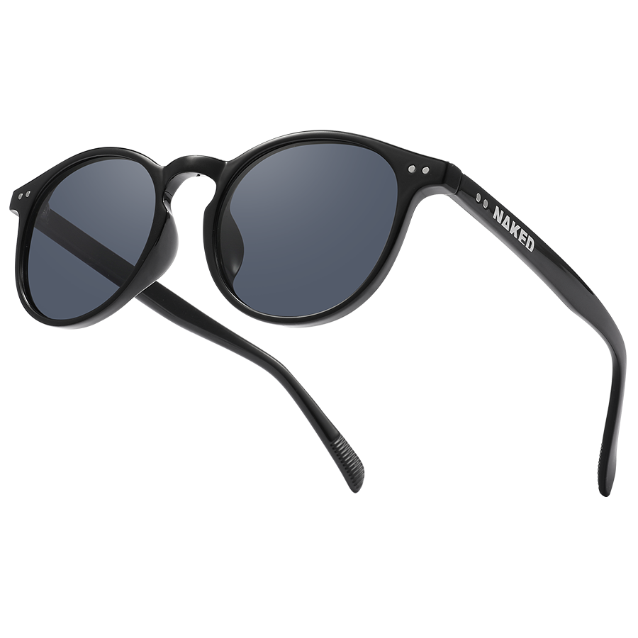 Black sunglasses with round dark lenses and NAKED text on the temple, viewed at an angle. These stylish The WHOOP by NAKED Optics feature polarisierte Sonnenbrille Gläser and provide reliable UV400 Schutz for your eyes.