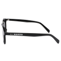Black sunglasses with “NAKED” written in white on the arm, shown from a side angle against a white background. The WHOOP by NAKED Optics features polarisierte Gläser and reliable UV400 Schutz, offering both style and protection. A bold statement piece from the NAKED Optics WHOOP collection.