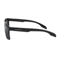 The LUX by NAKED Optics is a black rectangular lifestyle Sonnenbrille with “NAKED” displayed on the side, crafted with a durable TR90 Rahmen for lasting comfort and style. Shown from a side profile on a white background, this sunglasses model is the perfect accessory for any modern look.