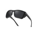 The SUMMIT by NAKED Optics are black wraparound sunglasses with thick frames and dark lenses, photographed on a white background—perfect as a Gletscherbrille for hochalpine Touren due to their reliable UV400 Schutz.