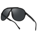 The PILOT by NAKED Optics is a black aviator-style sunglasses with an oversized design and dark UV400 lenses, displayed on a white background.