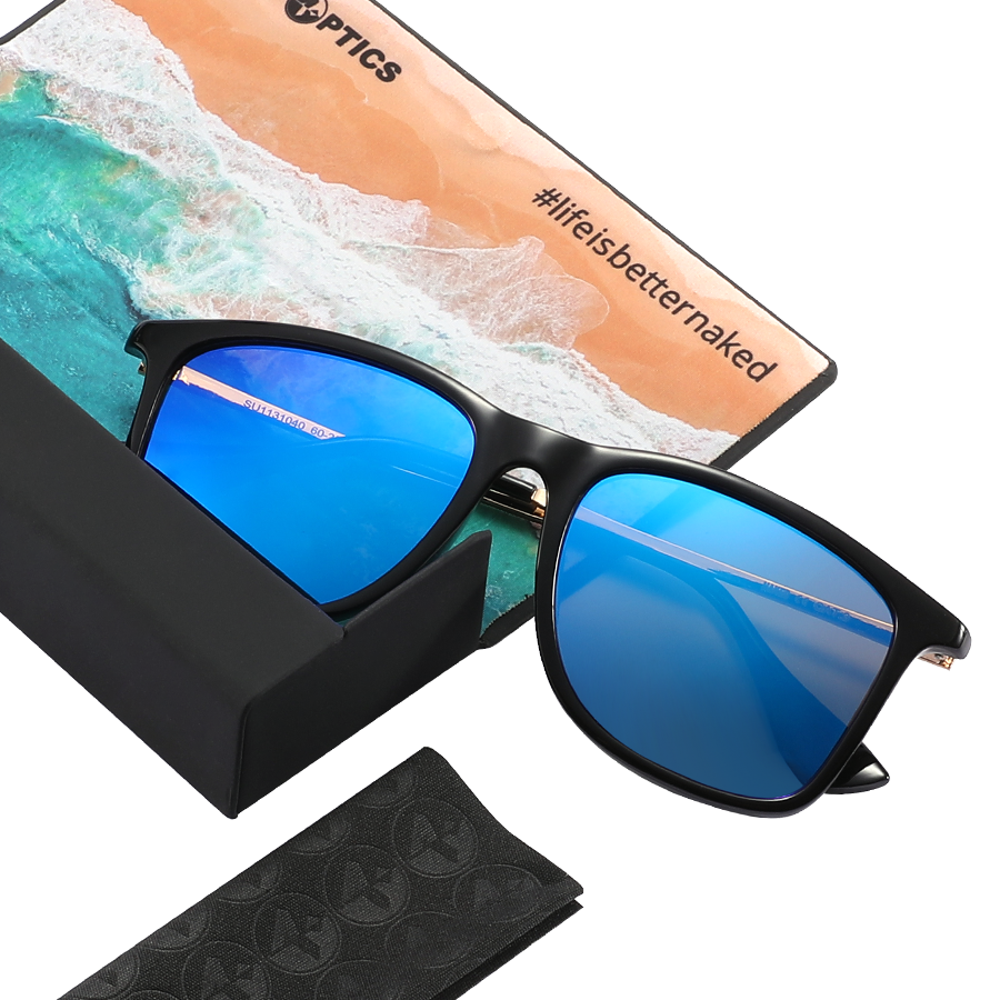 The ACE by NAKED Optics are black sunglasses featuring blue mirrored, polarized lenses for optimal UV protection, shown alongside a cleaning cloth and a box with a beach image and branding.