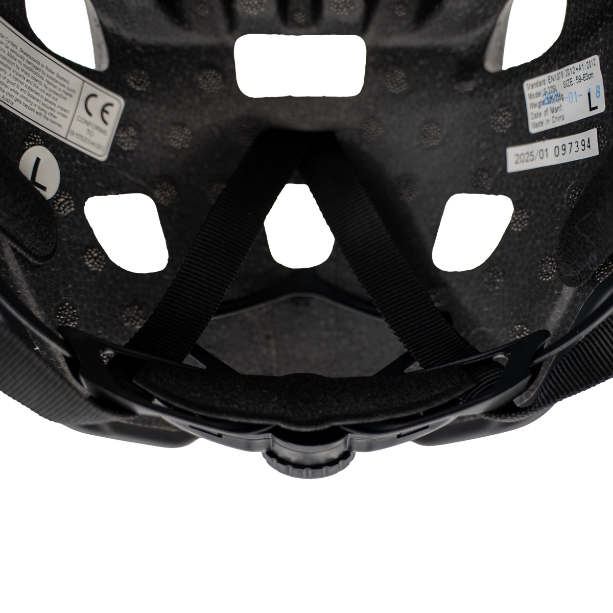 Inside view of the black NAKED Optics “The RIDGE” mountain bike helmet, showing straps, padding, and manufacturer labels.