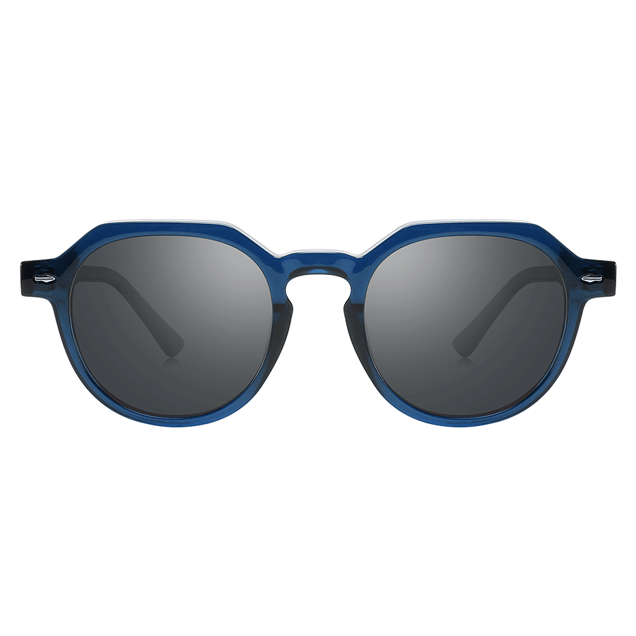 The LUNA by NAKED Optics showcases blue frames with round, dark polarized lenses and a chic keyhole bridge, making it the ideal lifestyle sunglasses for any occasion. Shown against a white background.