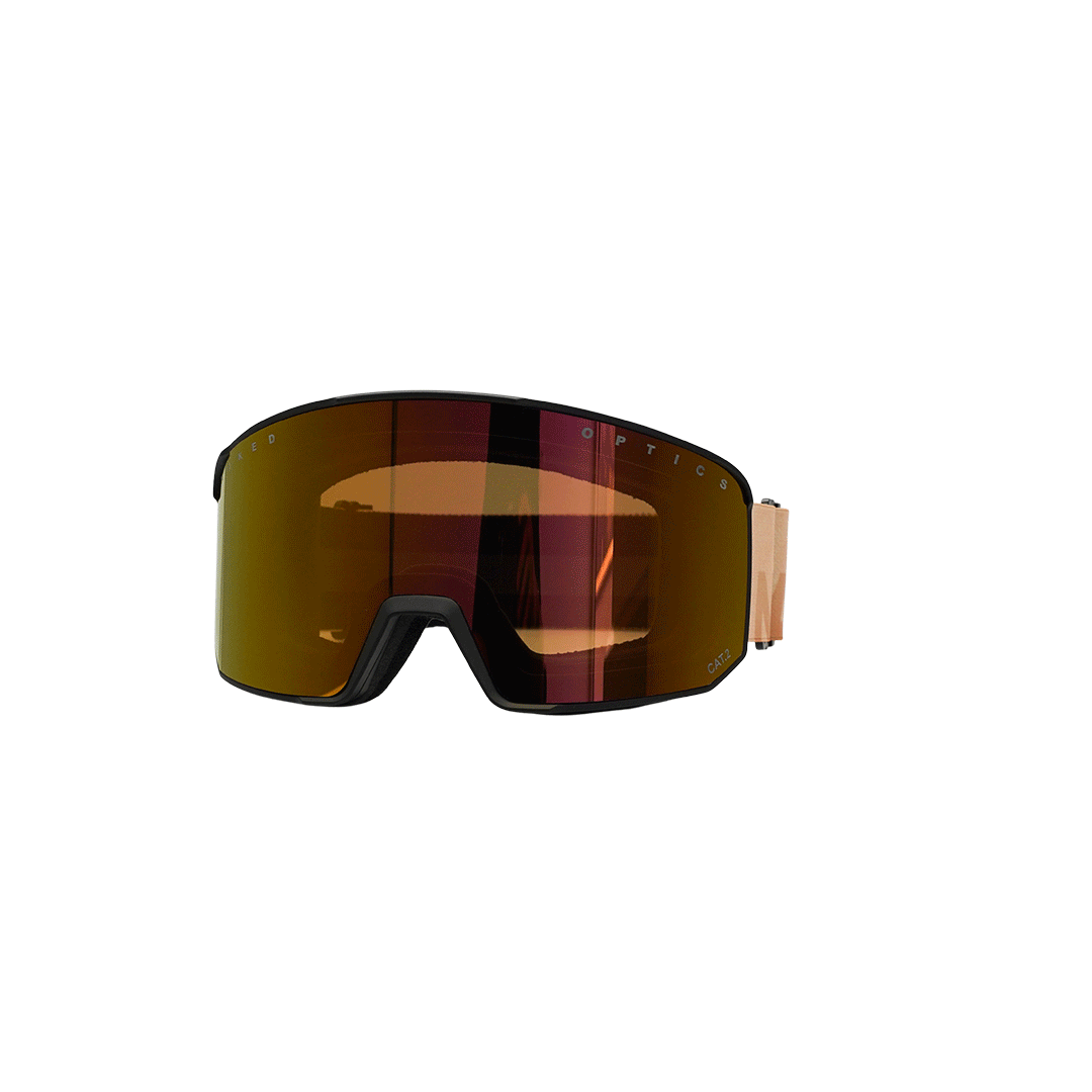 Il modello SOLAR di NAKED Optics è un paio di occhiali da sci marroni caratterizzati da una lente ampia e riflettente e da un cinturino regolabile color cuoio, progettati come occhiali da sci compatti, ideali per le donne o per chiunque cerchi un paio di occhiali da sci adatti a visi piccoli, raffigurati su uno sfondo bianco.