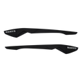 Due pezzi in plastica nera dalla forma spigolosa, con la scritta “NAKED” in bianco su ciascuno, progettati come stanghette di ricambio per gli occhiali sportivi NAKED Optics The FALCON (Ersatzbügel FALCON).