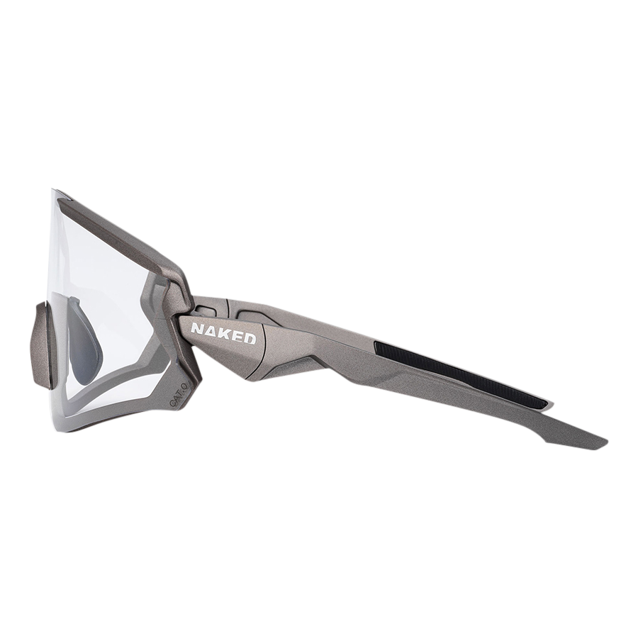 Side view of sporty, gray The FALCON sunglasses by NAKED Optics, featuring clear lenses, UV400 protection, and the NAKED logo on the frame.