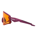 Le modèle FALCON de NAKED Optics est une paire de lunettes de soleil de sport violettes, dotées de verres réfléchissants orange et arborant le logo NAKED sur la monture, visible de profil. Ces lunettes de sport offrent une protection UV400 pour une sécurité oculaire optimale lors des activités de plein air.