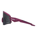 Side view of sporty maroon The FALCON sunglasses from NAKED Optics, featuring a large dark lens and the word NAKED on the frame, providing reliable UV400 protection for your eyes.