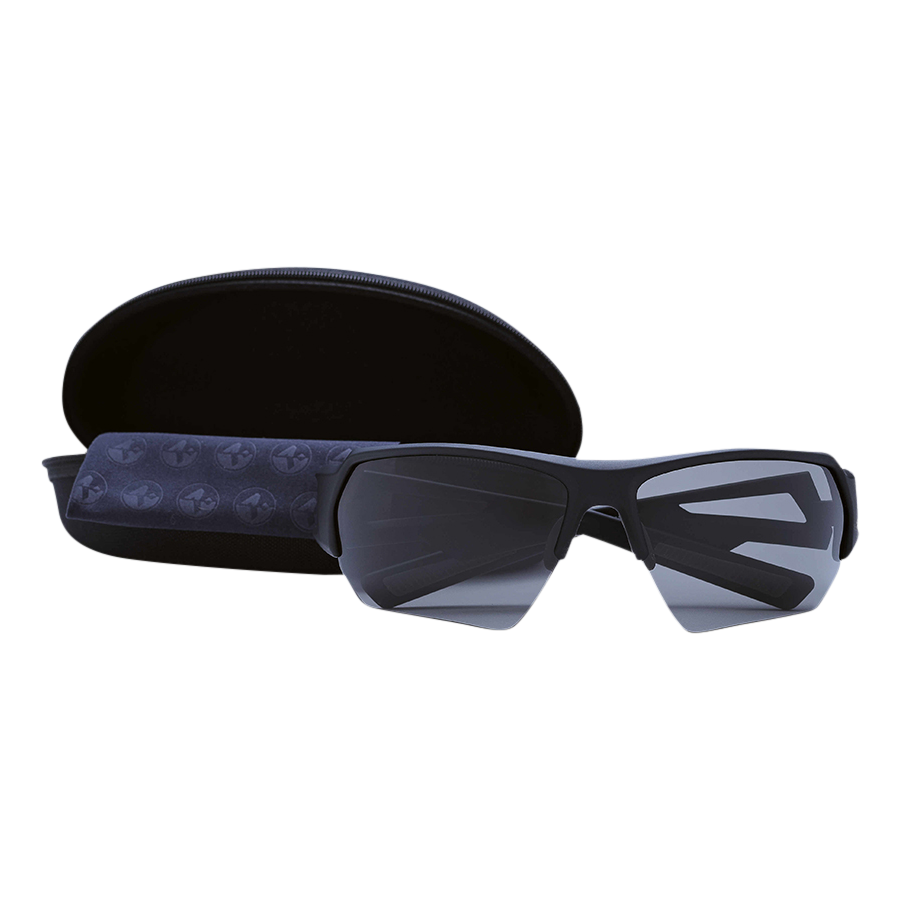 The CHARGE Halfframe by NAKED Optics is a black wraparound sportbrille with reflective lenses, featuring an ultralight design and UV400 protection, and comes complete with a case and cleaning cloth on a white background.