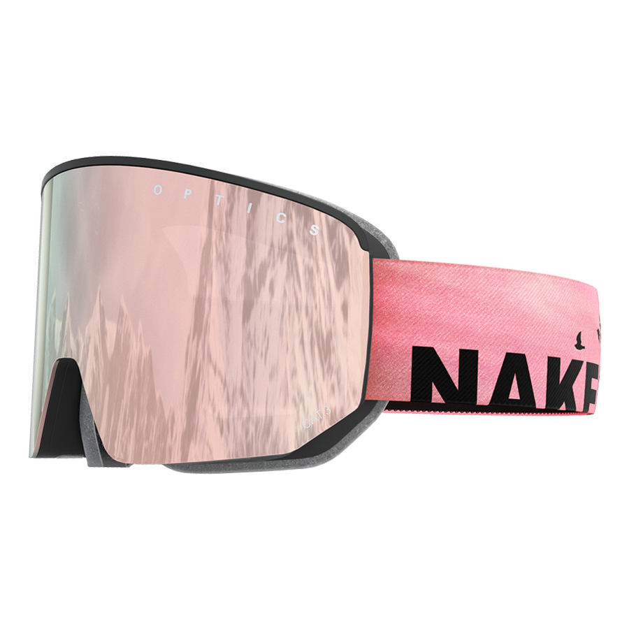 Wir stellen vor: Die NOVA von NAKED Optics. Diese pinkfarbene Skibrille verfügt über eine verspiegelte Scheibe und ein pinkfarbenes Band, auf dem der Schriftzug „NAKED“ in schwarzen Buchstaben auffällig prangt. Ausgestattet mit einem innovativen Magnetwechselsystem für mühelosen Scheibenwechsel und einer wirksamen Anti-Fog-Beschichtung sorgt die NOVA für klare Sicht auf jeder Piste.