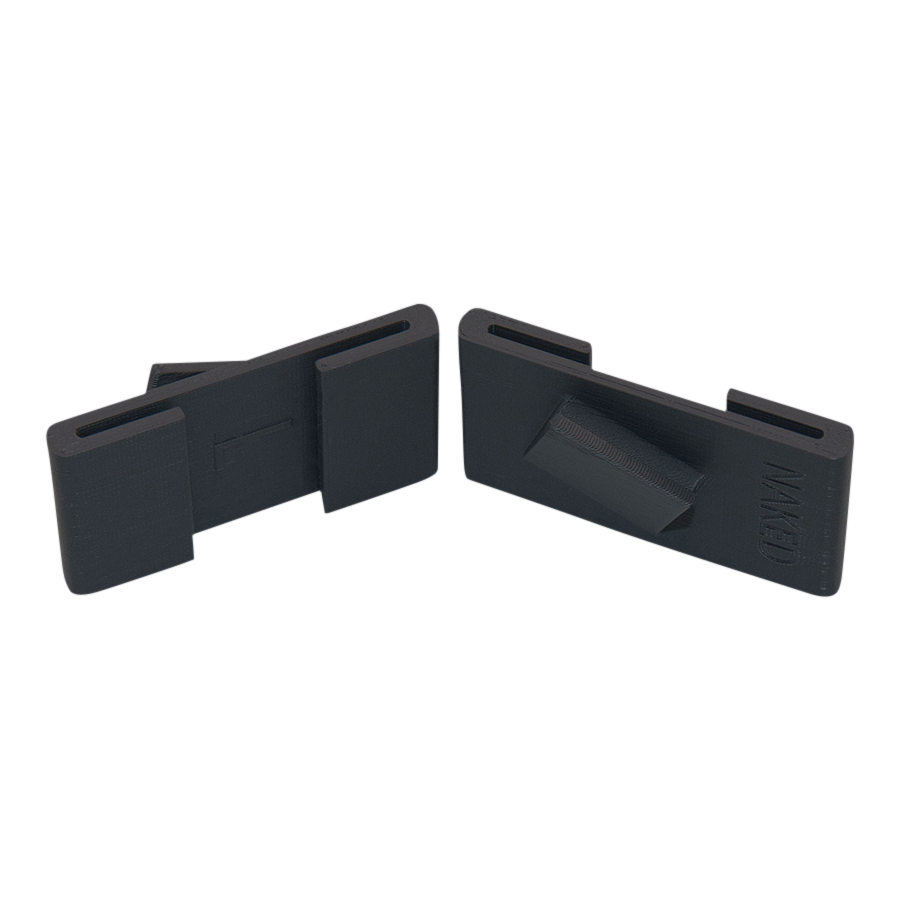 Two black rectangular plastic clips with angled inner supports, the NAKED Optics Maskenclip für FFP2 Maske, designed for Brillenband Befestigung or as Maskenclips Skifahren accessories, shown on a plain white background.