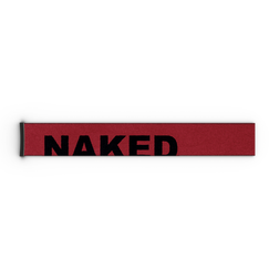 Ein rotes 45-mm-Stoffband „Extra Strap“ von NAKED Optics mit auffälligem schwarzem „NAKED“-Schriftzug – der teilweise auf weißem Hintergrund zu sehen ist – ist das perfekte Ersatzband-Zubehör für das Skibrillenmodell FORCE EVO.