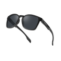 The LUX by NAKED Optics features dark lenses and a durable TR90 Rahmen, displayed on a white background with one arm slightly open.