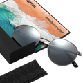 The PARKER round sunglasses by NAKED Optics feature a silver metal frame and provide UV400 protection; they come with a beach-themed cleaning cloth and a sleek black case, all presented on a white background.