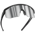 Introducing The SHYFT by NAKED Optics: sleek black sports sunglasses featuring mirrored lenses and signature NAKED branding on both the frame and lens. Enjoy maximum comfort thanks to Passform-Optimierung and experience next-level performance with individuell angepasste Sportbrillen, crafted using innovative 3D-Druck Sportbrille technology.