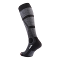 Skisocken Merino by NAKED Optics in gray and black, featuring geometric patterns, shown on a white background.